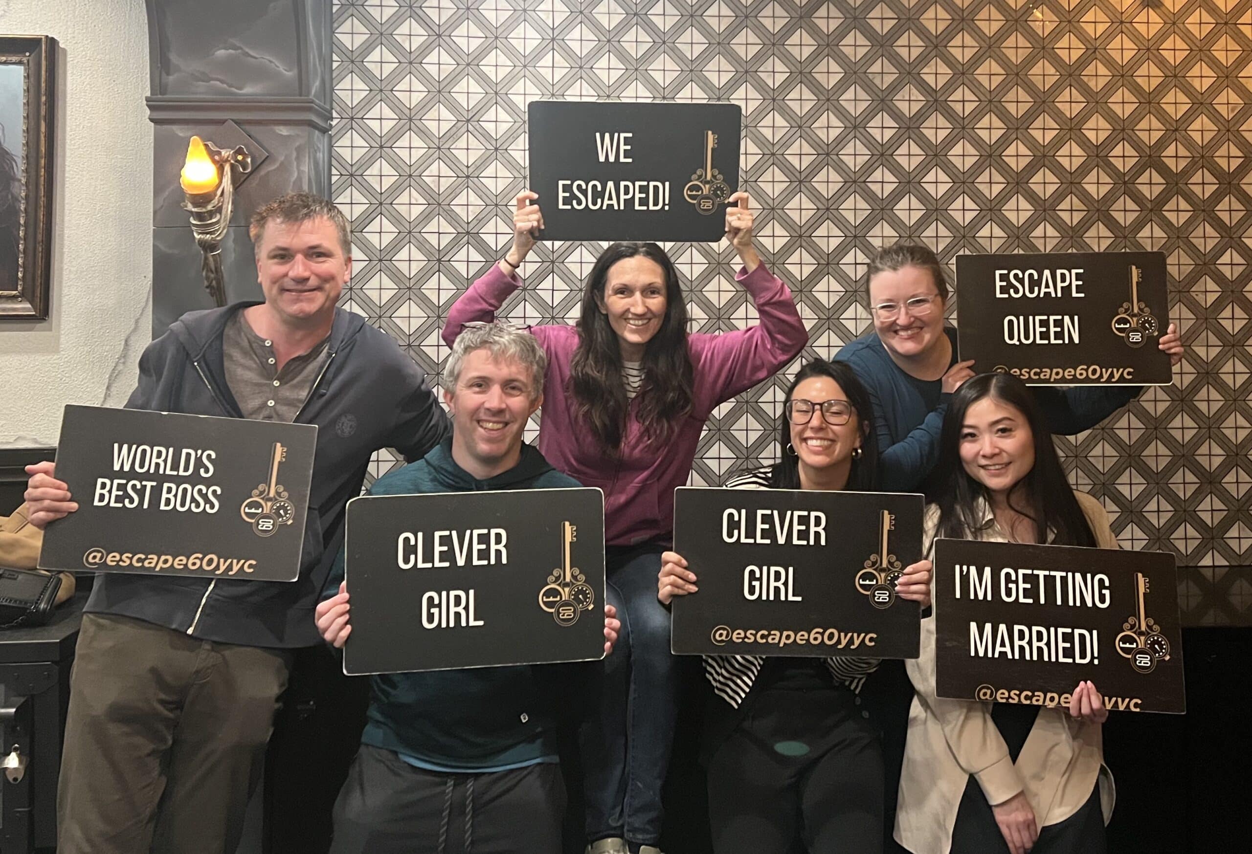 One Life team holding up signs